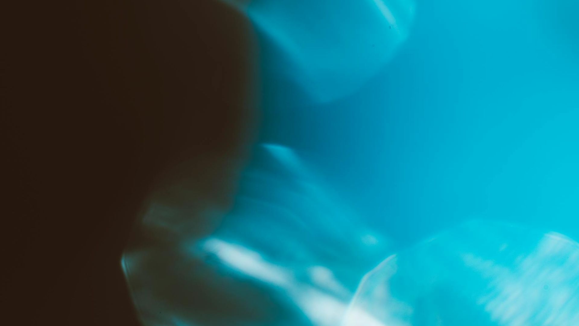 Abstract background with soft gradients representing movement and calm.